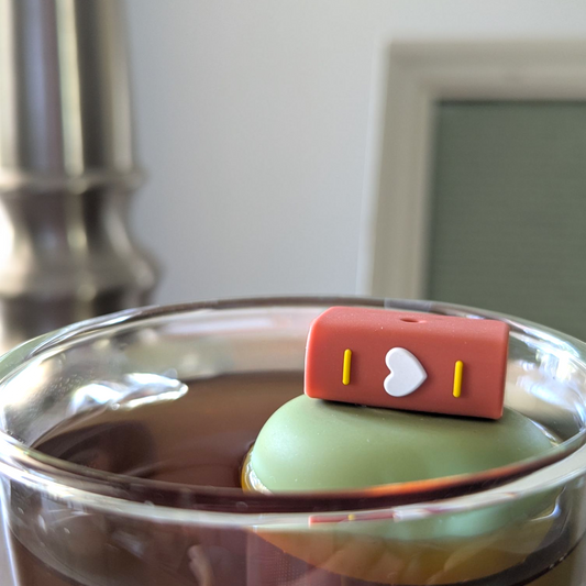 Floating Brown Book Tea infuser
