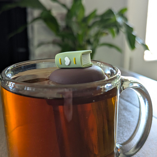 Floating Green Heart Book Tea infuser