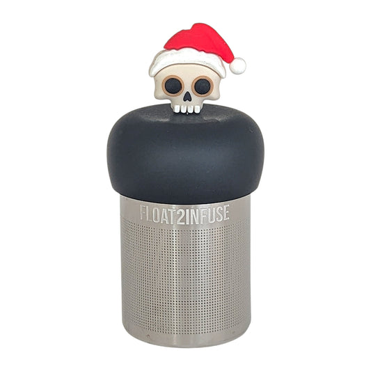 skull with a santa hat tea infuser for loose leaf tea  with a fine mesh stainless steel tea infuser that reads FLOAT2INFUSE on a black base with a white background