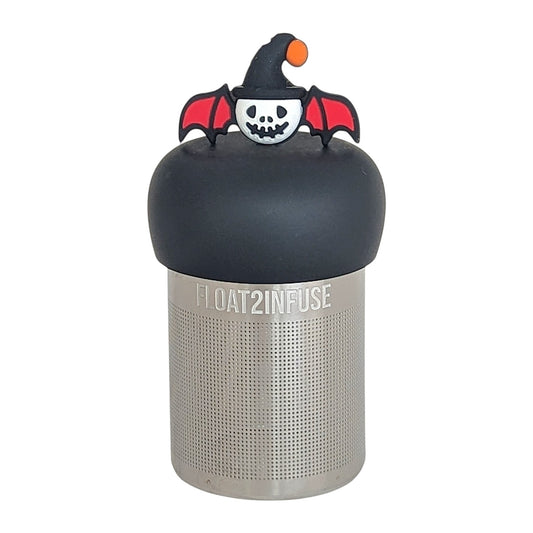 skull with bat wings and halloween hat tea infuser for loose leaf tea with a fine mesh stainless steel tea infuser that reads FLOAT2INFUSE on a black base with a white background
