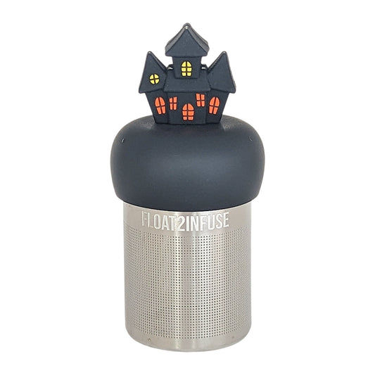 black spooky halloween house tea infuser for loose leaf tea with a fine mesh stainless steel tea infuser that reads FLOAT2INFUSE on a black base with a white background