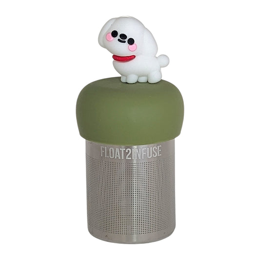 cute white maltese dog animal tea infuser for loose leaf tea  with a fine mesh stainless steel tea infuser that reads FLOAT2INFUSE on a green base with a white background