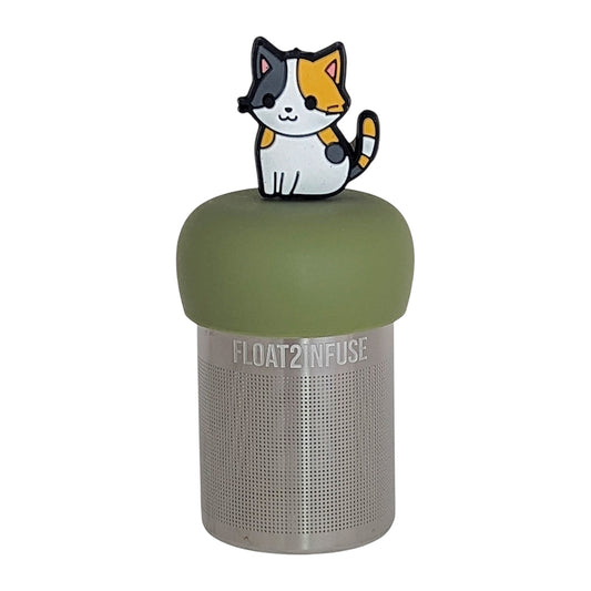 anime Calico cat animal tea infuser for loose leaf tea with a fine mesh stainless steel tea infuser that reads FLOAT2INFUSE on a green base with a white background