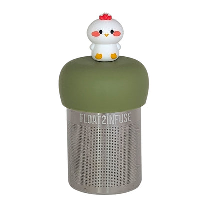 white baby chicken tea infuser for loose leaf tea  with a fine mesh stainless steel tea infuser that reads FLOAT2INFUSE on a green base with a white background