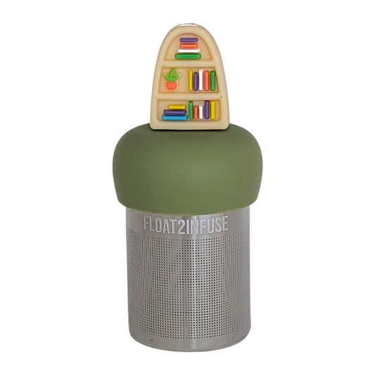 blonde plant bookshelf tea infuser for loose leaf tea  with a fine mesh stainless steel tea infuser that reads FLOAT2INFUSE on a green base with a white background