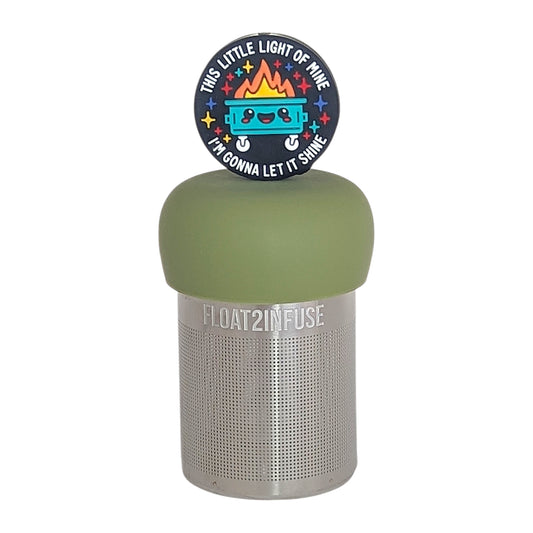 black circle that reads "this little light of mine I'm gonna let it shine" surrounding a smiling dumpster tea infuser for loose leaf tea  with a fine mesh stainless steel tea infuser that reads FLOAT2INFUSE on a green base with a white background