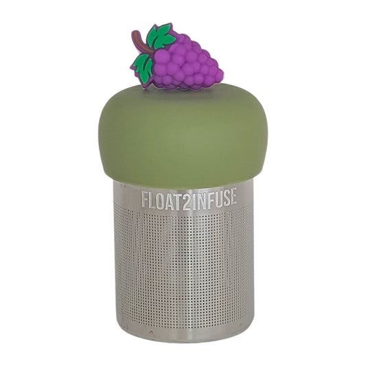 purple grapes tea infuser for loose leaf tea with a fine mesh stainless steel tea infuser that reads FLOAT2INFUSE on a green base with a white background