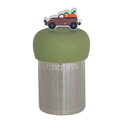 brown pumpkin truck tea infuser for loose leaf tea  with a fine mesh stainless steel tea infuser that reads FLOAT2INFUSE on a green base with a white background