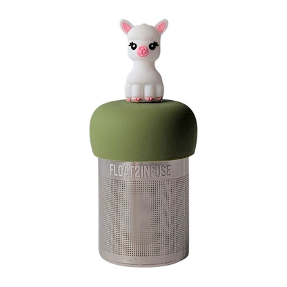 Baby alpaca infuser for loose leaf tea with a fine mesh stainless steel tea strainer that reads FLOAT2INFUSE on a green base with a white background