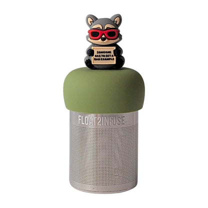 Cool raccoon with red sunglasses holding a sign that reads "someone has to set a bad example" tea infuser for loose leaf tea with a fine mesh stainless steel tea strainer that reads FLOAT2INFUSE on a green base with a white background