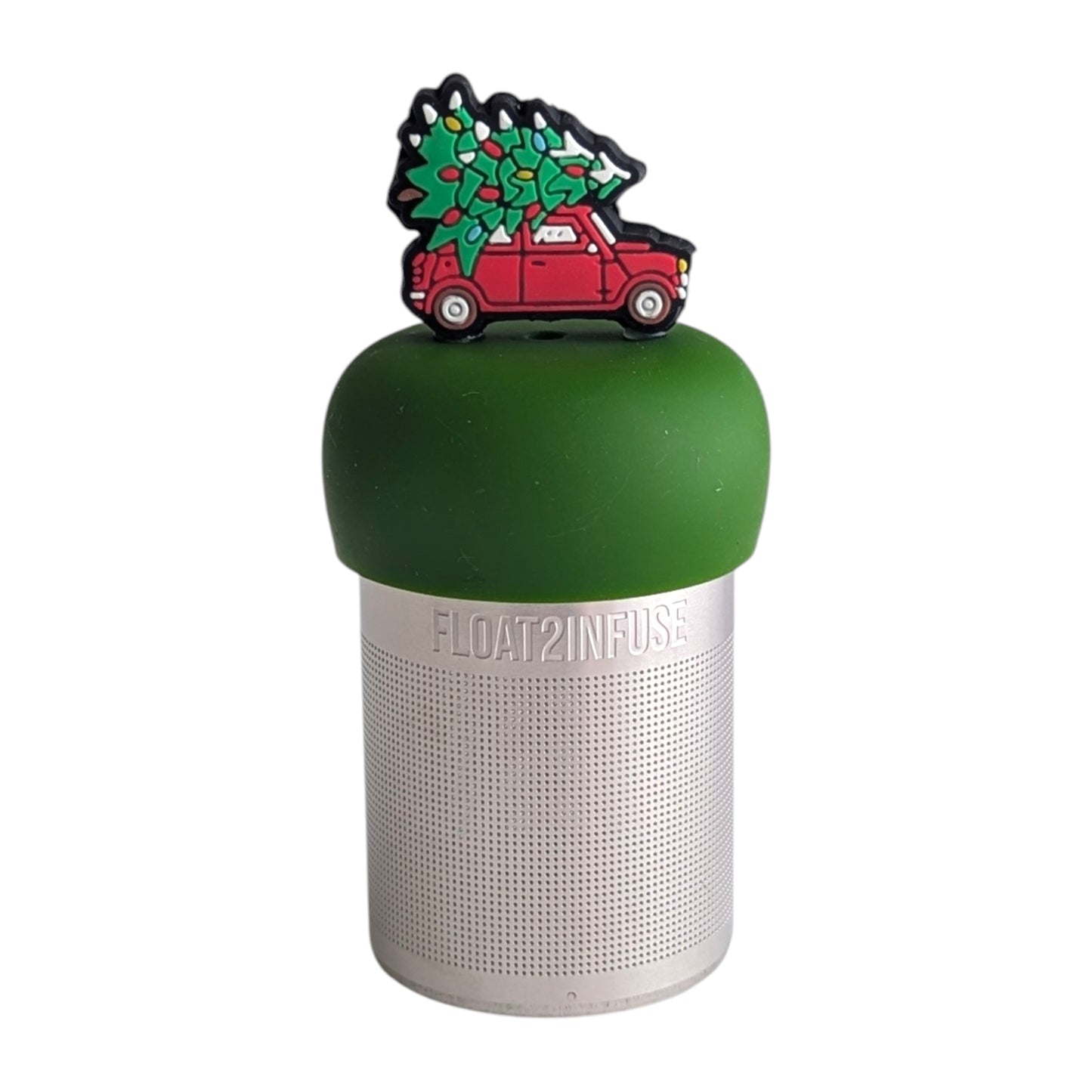 Side view of a red pickup truck with a decorated christmas tree in the bed tea infuser for loose leaf tea with a fine mesh stainless steel tea strainer that reads FLOAT2INFUSE on a dark green base with a white background
