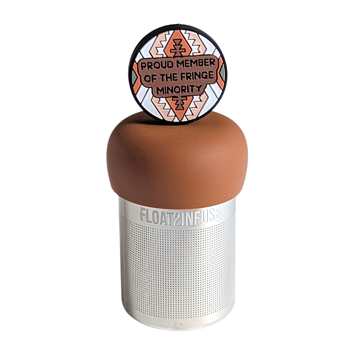Circle with a brown, beige, green, and white geometric pattern with the text "proud member of the fringe minority" in the center tea infuser for loose leaf tea with a fine mesh stainless steel tea strainer that reads FLOAT2INFUSE on a brown base with a white background
