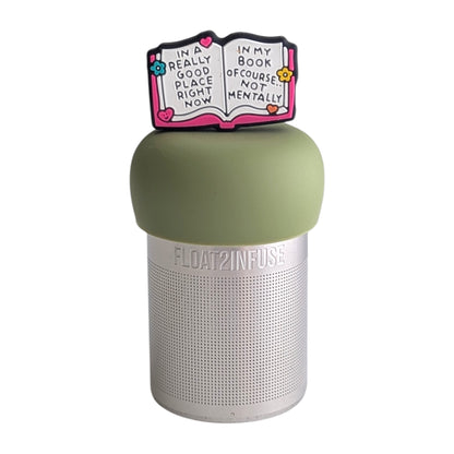 Open book with the text "in a really good place right now. In my book of course...not mentally" tea infuser for loose leaf tea with a fine mesh stainless steel tea strainer 
that reads FLOAT2INFUSE on a green base with a white background
