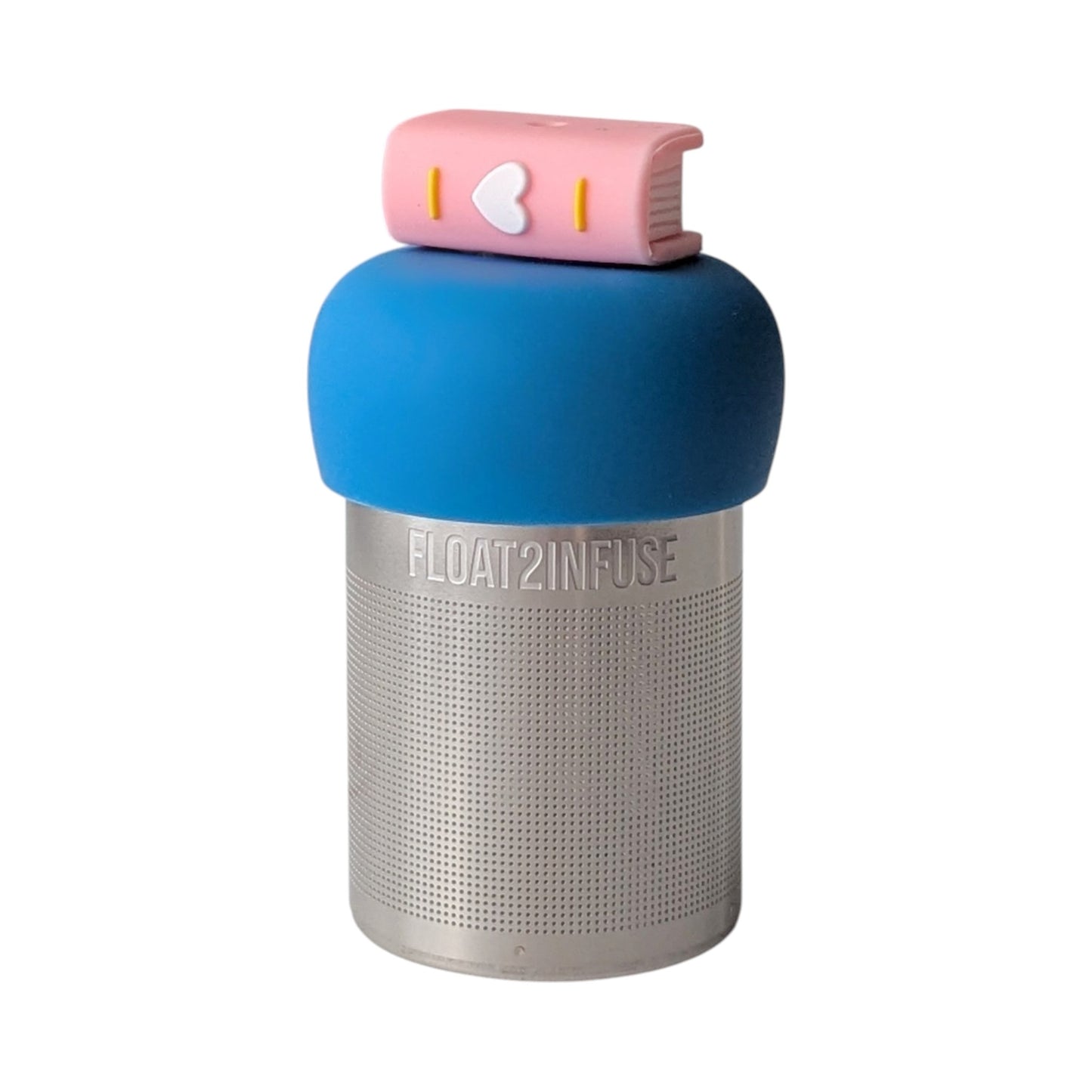 Light pink book with a white heart on the spine tea infuser for loose leaf tea with a fine mesh stainless steel tea strainer that reads FLOAT2INFUSE on a blue base with a white background