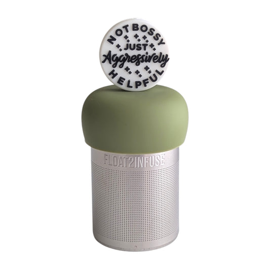 White circle with black text that reads "not bossy just aggressively helpful" tea infuser for loose leaf tea with a fine mesh stainless steel tea strainer 
that reads FLOAT2INFUSE on a green base
