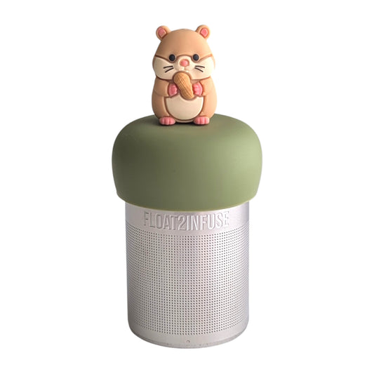 Adorable light brown chipmunk holding a peanut tea infuser for loose leaf tea with a fine mesh stainless steel tea strainer 
that reads FLOAT2INFUSE on a green base with a white background
