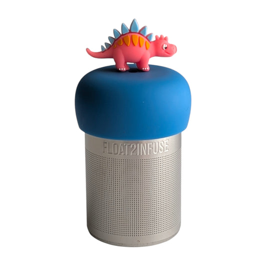 cute pink stegosaurus with blue spikes tea infuser for loose leaf tea with a fine mesh stainless steel tea strainer 
that reads FLOAT2INFUSE on a green base with a white background
