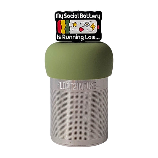 Empty battery with text "my social battery is running low" tea infuser for loose leaf tea with a fine mesh stainless steel tea strainer 
that reads FLOAT2INFUSE on a green base with a white background
