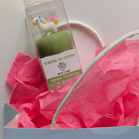 Floating unicorn tea infuser in easy to gift box in gift bag with pink tissue paper
