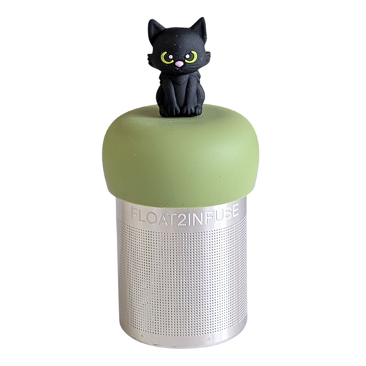 Black cat tea infuser with a green base for loose leaf tea with a fine mesh stainless steel tea strainer that reads FLOAT2INFUSE with a white background