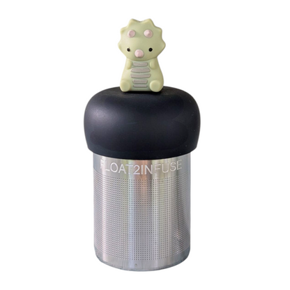 triceratops dinosaur tea infuser for loose leaf tea with fine mesh stainless steel tea strainer that reads FLOAT2INFUSE on a black base with a white background