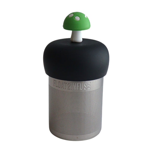 Green mushroom tea infuser for loose leaf tea with a fine mesh stainless steel tea strainer that reads FLOAT2INFUSE on a black base with a white background
