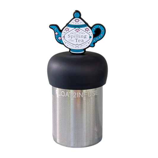 blue and white tea kettle that reads "spilling the tea" tea infuser for loose leaf tea with fine mesh stainless steel tea strainer that reads FLOAT2INFUSE on a black base with a white background