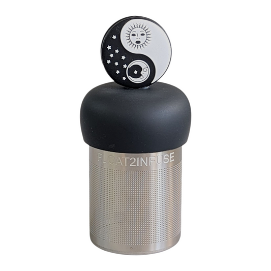 black and white yin and yang symbol with sun and moon tea infuser  for loose leaf tea with fine mesh stainless steel tea strainer that reads FLOAT2INFUSE on a black base with a white background