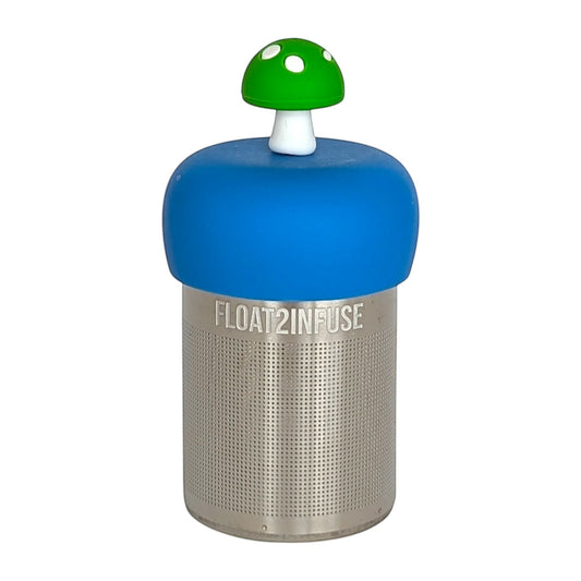 green mushroom tea infuser with blue base for loose leaf tea with fine mesh stainless steel tea strainer that reads FLOAT2INFUSE with white background