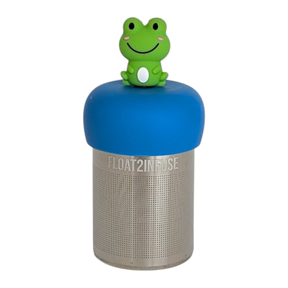 smiling green frog tea infuser  for loose leaf tea with fine mesh stainless steel tea strainer that reads FLOAT2INFUSE on a blue base with white background