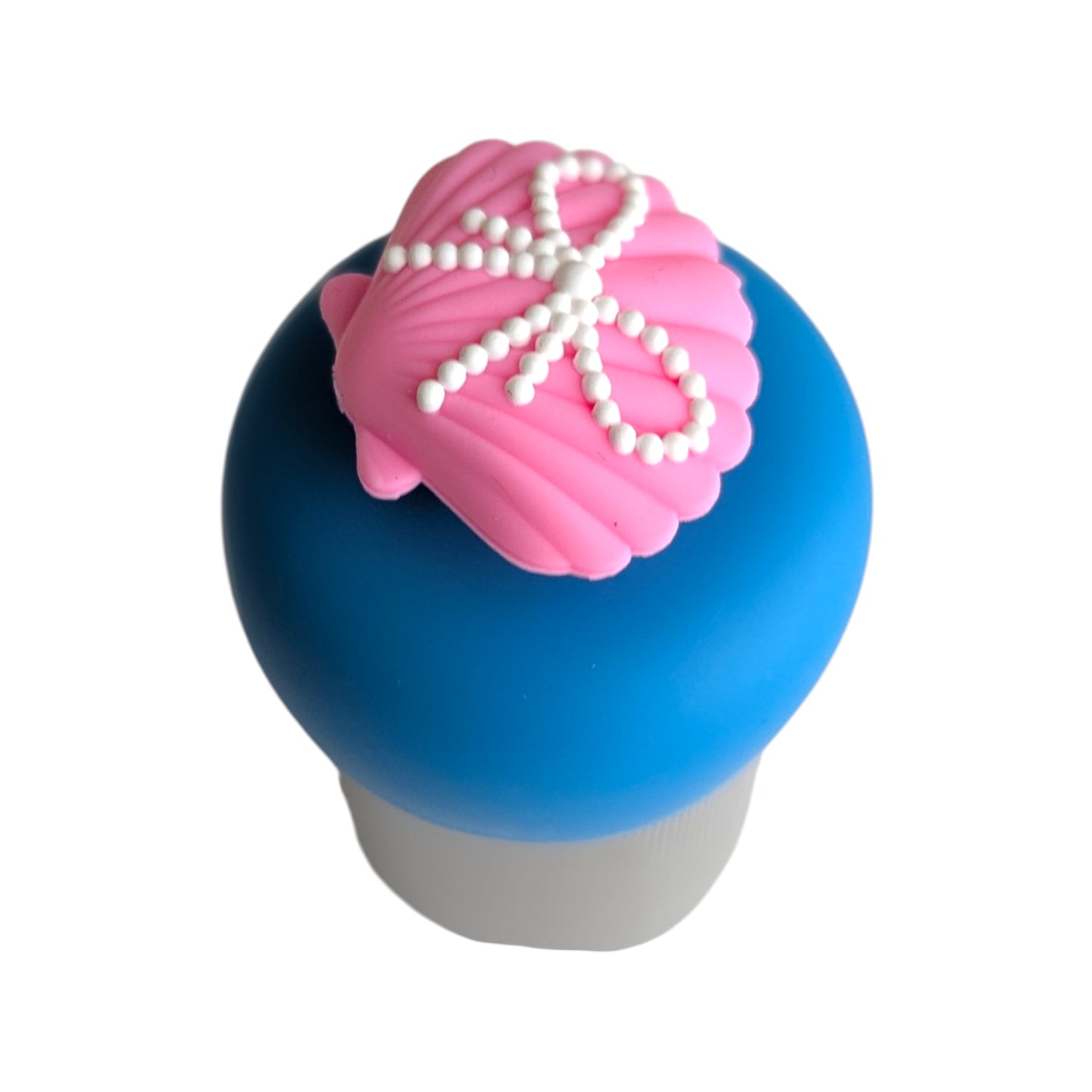 Pink seashell with pearl bow tea infuser for loose leaf tea with a fine mesh stainless steel tea strainer 
that reads FLOAT2INFUSE on a blue base with a white background
