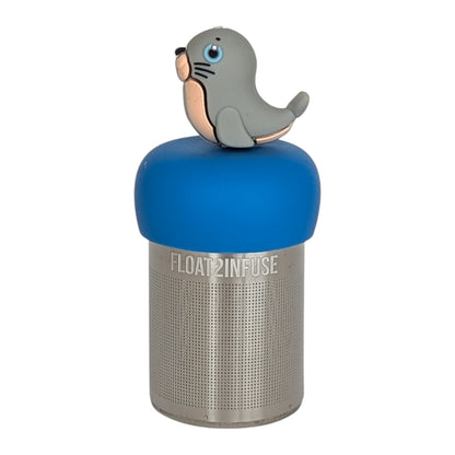 grey and tan seal tea infuser  for loose leaf tea with fine mesh stainless steel tea strainer that reads FLOAT2INFUSE on a  blue base with a white background