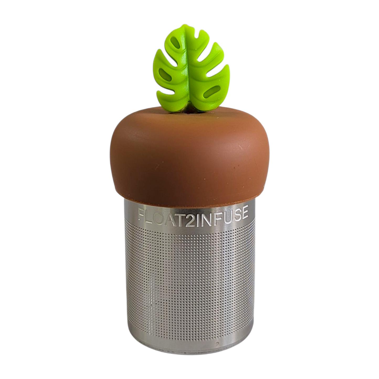 lime green monstera leaf tea infuser for loose leaf tea with fine mesh stainless steel tea strainer that reads FLOAT2INFUSE on a brown base with a white background