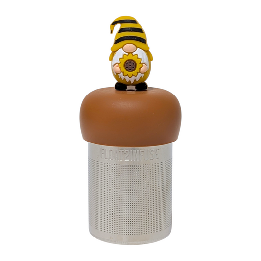 Black and yellow striped gnome holding sunflower tea infuser with a brown base for loose leaf tea with a fine mesh stainless steel tea strainer that reads FLOAT2INFUSE with a white background