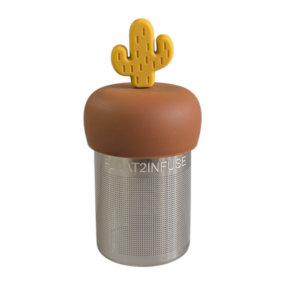 yellow cactus tea infuser for loose leaf tea with fine mesh stainless steel tea strainer that reads FLOAT2INFUSE on a brown base with a white background
