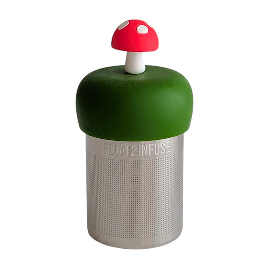 Red mushroom tea infuser for loose leaf tea with a fine mesh stainless steel tea strainer 
that reads FLOAT2INFUSE on a dark green base with a white background
