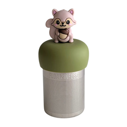 Cute 3D rose gold colored squirrel holding an acorn tea infuser for loose leaf tea with a fine mesh stainless steel tea strainer that reads FLOAT2INFUSE on a green base with a white background
