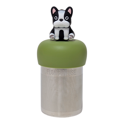 Black and white terrier dog tea infuser with a green base for loose leaf tea with a fine mesh stainless steel tea strainer that reads FLOAT2INFUSE with a white background