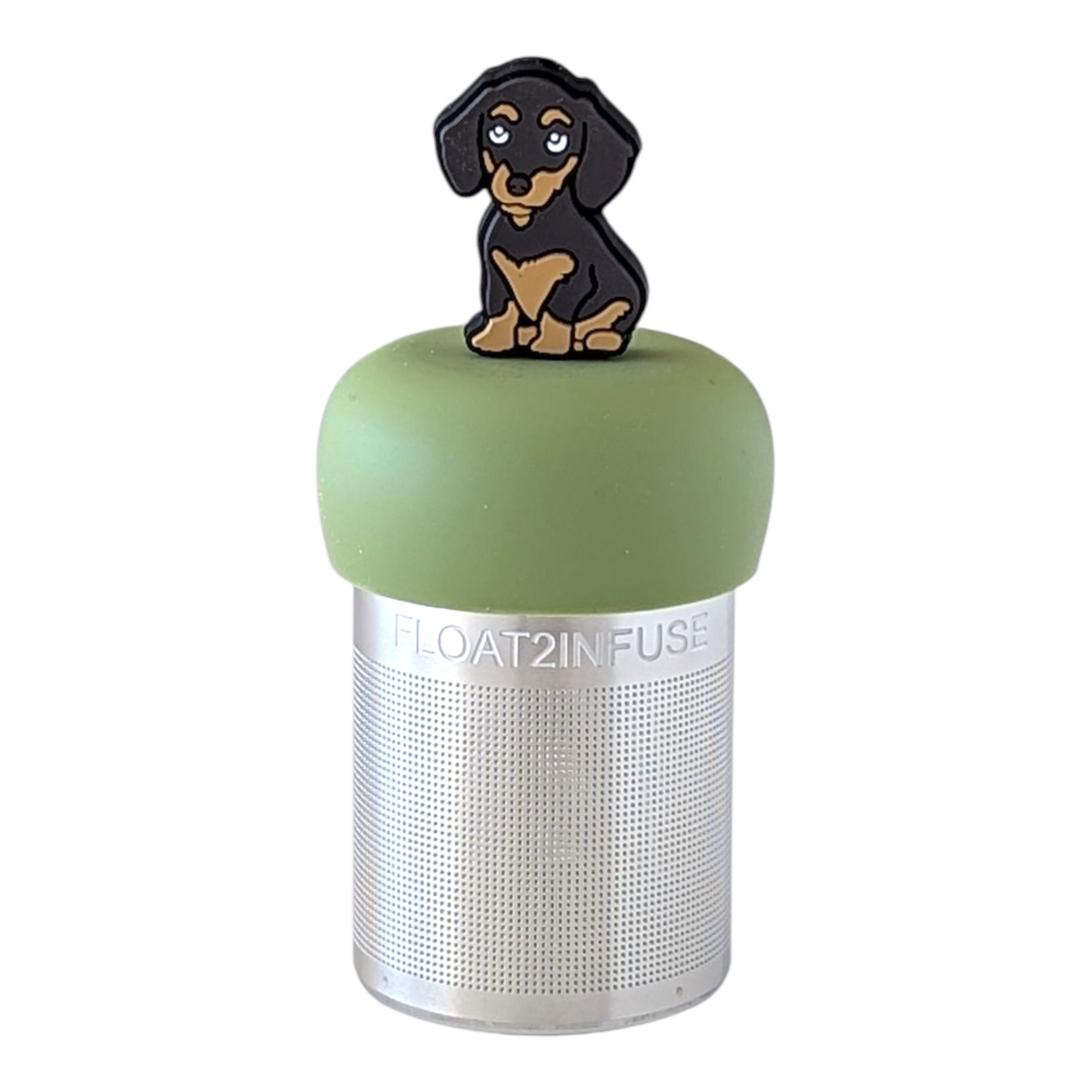 black and tan dachshund dog tea infuser for loose leaf tea with a fine mesh stainless steel tea strainer  that reads FLOAT2INFUSE on a green base with a white background