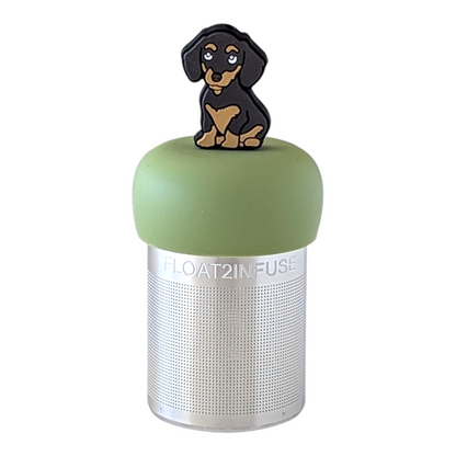 black and tan dachshund dog tea infuser for loose leaf tea with a fine mesh stainless steel tea strainer  that reads FLOAT2INFUSE on a green base with a white background