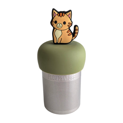 Anime orange striped cat tea infuser for loose leaf tea  with a fine mesh stainless steel tea infuser that reads FLOAT2INFUSE on a green base with a white background