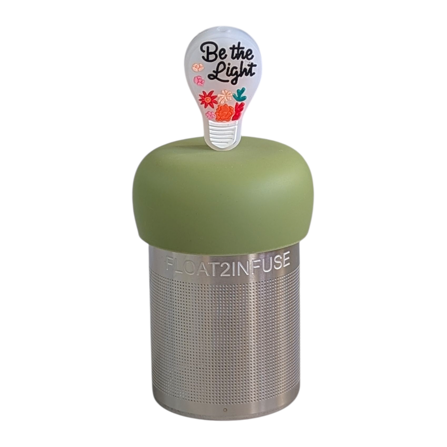 lightbulb with text that reads "be the light" and a floral pattern tea infuser  for loose leaf tea with fine mesh stainless steel tea strainer that reads FLOAT2INFUSE on a green base with white background
