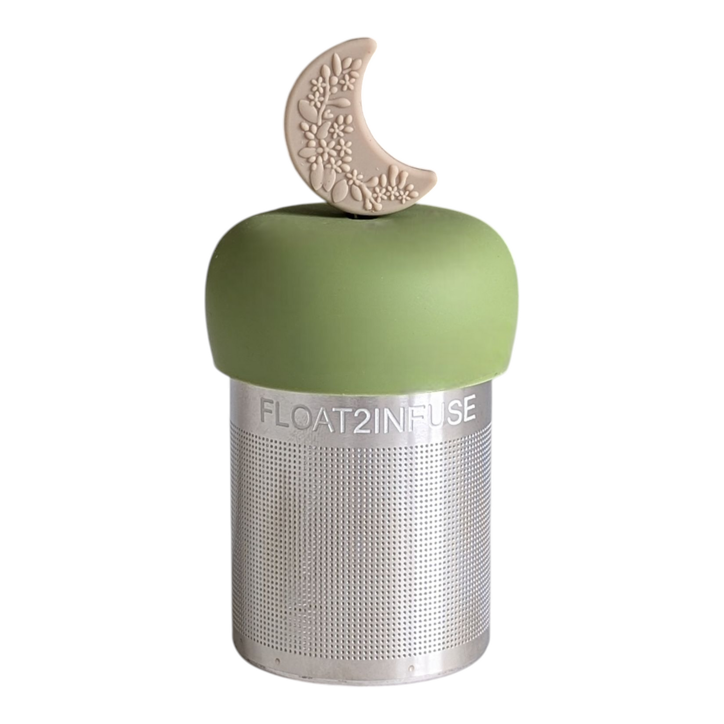 beige crescent moon with raised floral pattern tea infuser  for loose leaf tea with fine mesh stainless steel tea strainer that reads FLOAT2INFUSE on a green base with white background