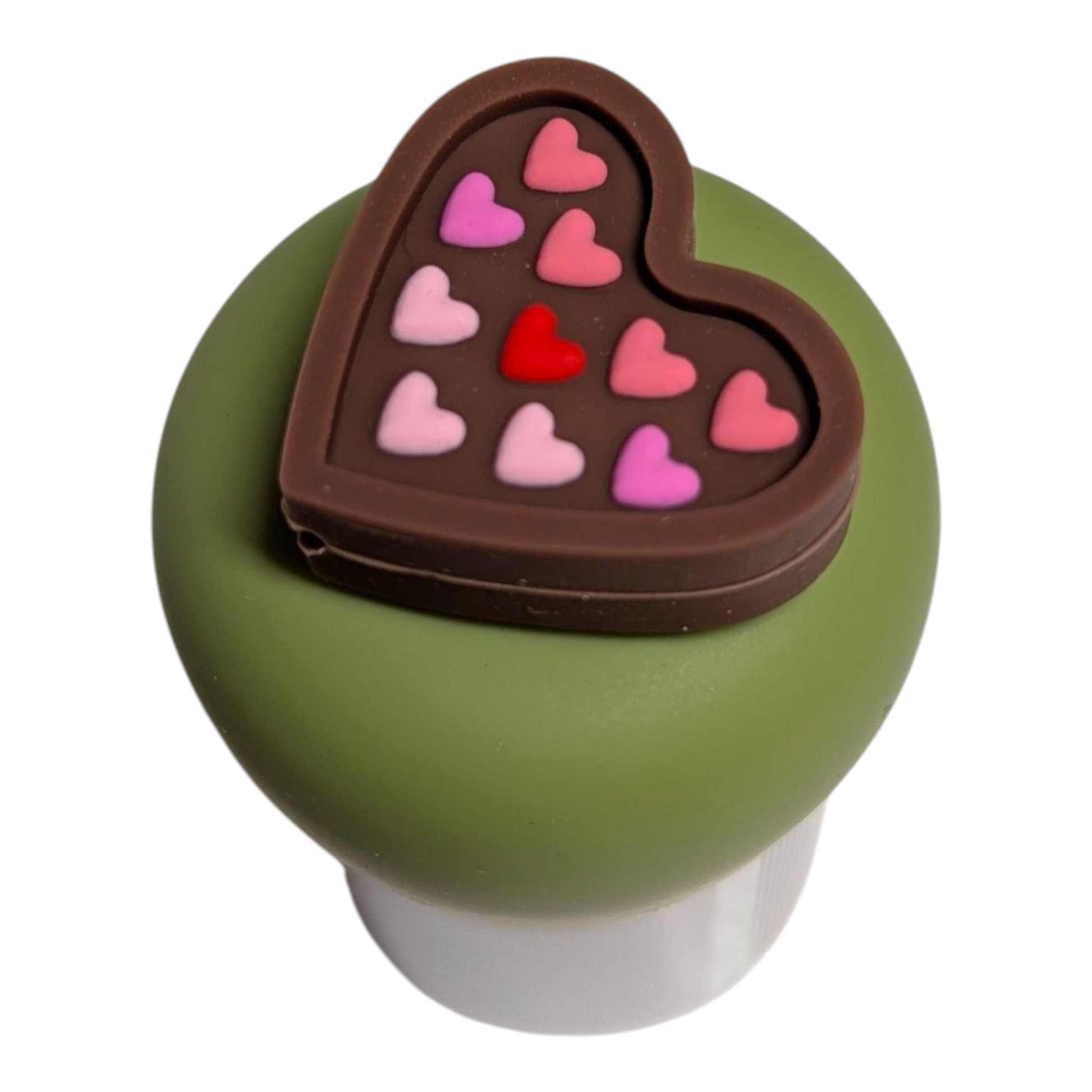 heart shaped box of chocolates with pink and red hearts tea infuser for loose leaf tea with a fine mesh stainless steel tea strainer  that reads FLOAT2INFUSE on a green base with a white background
