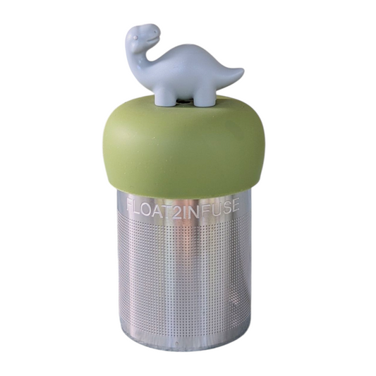 smiling grey brachiosaurus dinosaur tea infuser  for loose leaf tea with fine mesh stainless steel tea strainer that reads FLOAT2INFUSE on a green base with a white background