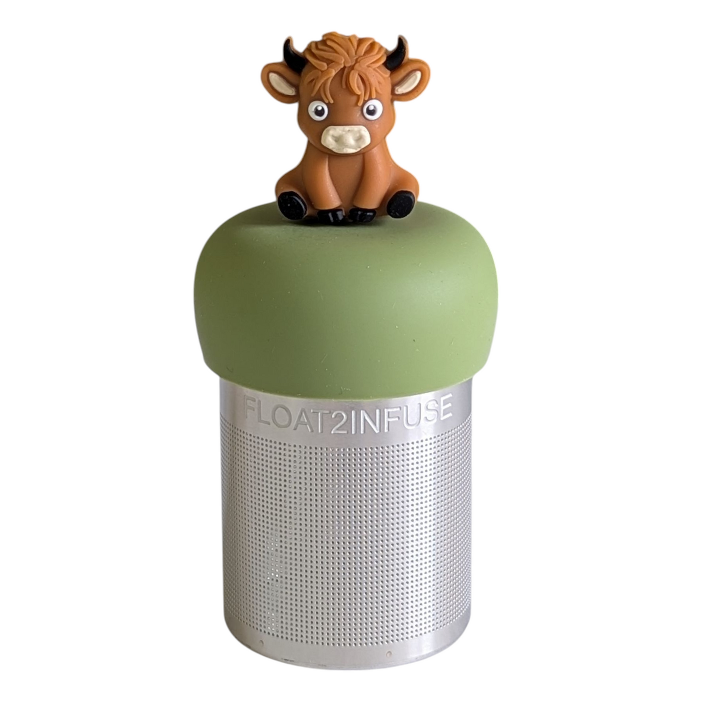 baby brown highland cow animal tea infuser for loose leaf tea with a fine mesh stainless steel tea strainer that reads FLOAT2INFUSE on a green base with a white background