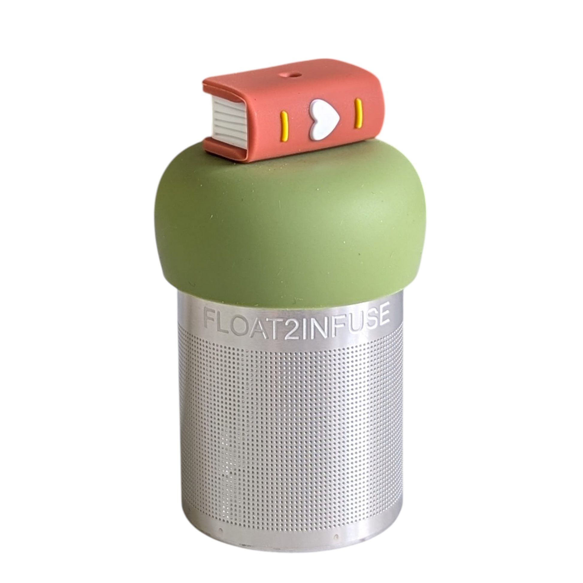 brown book with a white heart tea infuser for loose leaf tea with a fine mesh stainless steel tea strainer that reads FLOAT2INFUSE on a green base with a white background