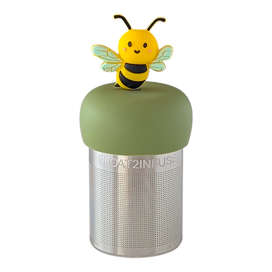 smiling yellow and black bumblebee for loose leaf tea with fine mesh stainless steel tea strainer that reads FLOAT2INFUSE on a green base with a white background