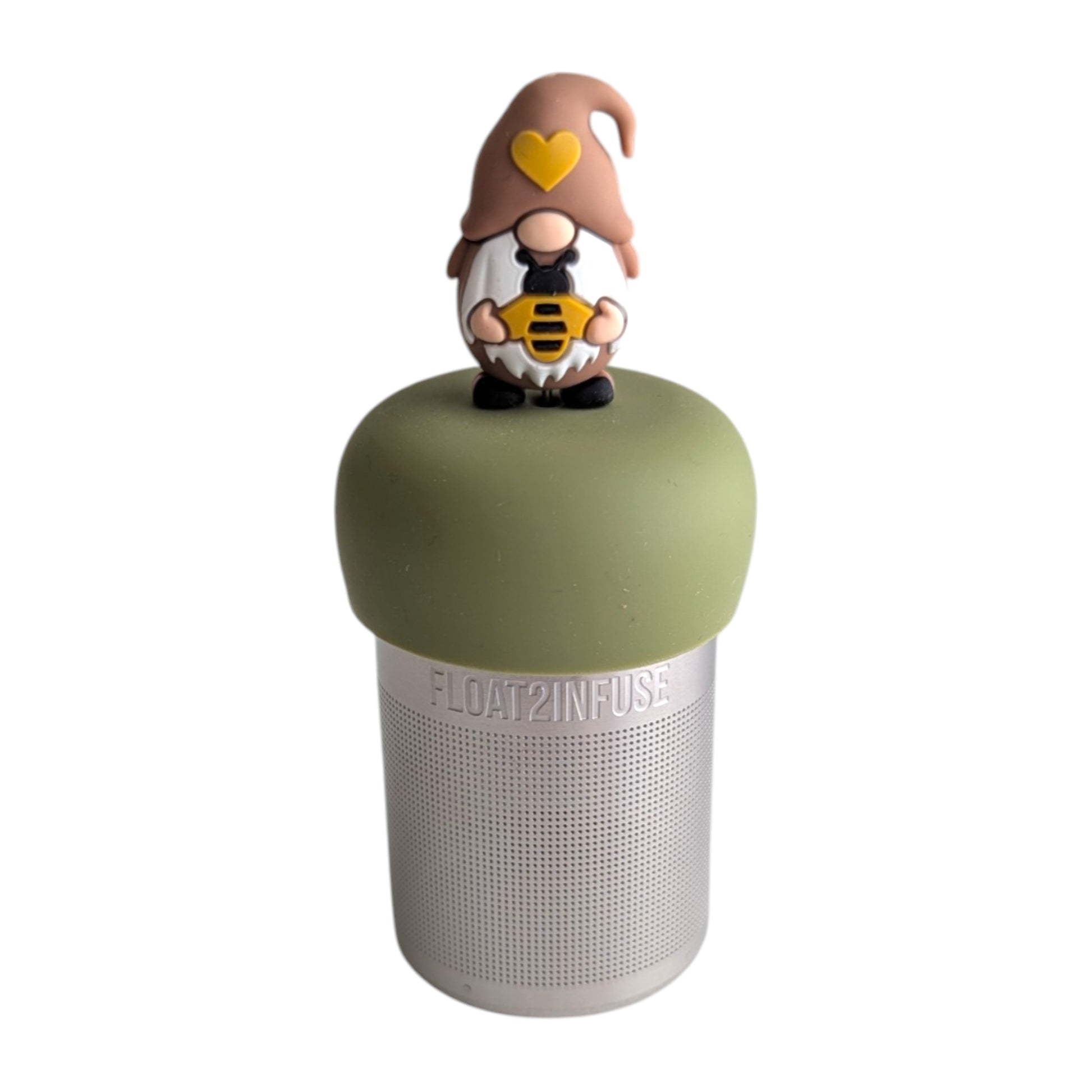 Gnome wearing a brown outfit holding a bumblebee tea infuser  for loose leaf tea with a fine mesh stainless steel tea strainer that reads FLOAT2INFUSE on a green base with a white background