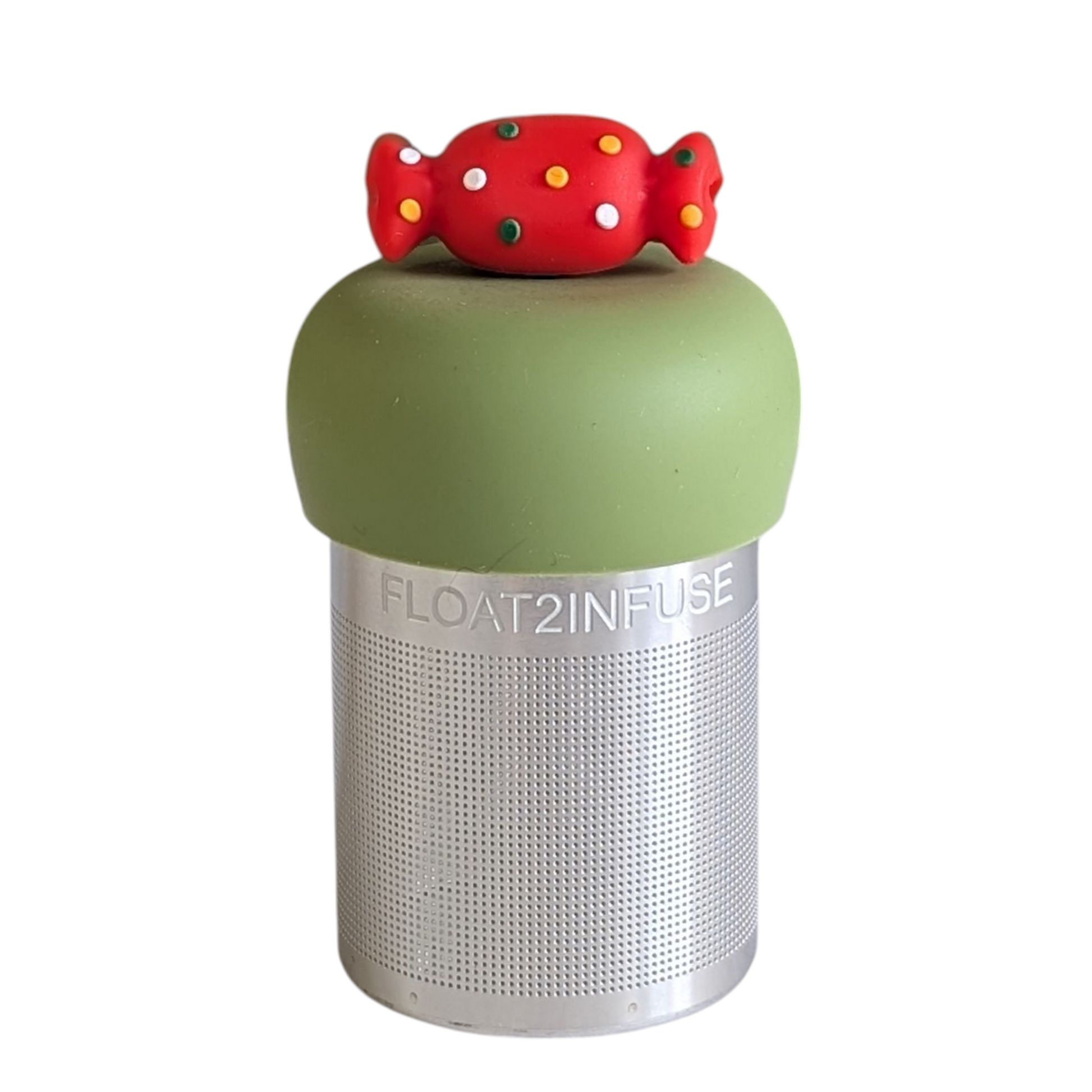 red holiday candy with green, yellow, and white polka dots tea infuser for loose leaf tea with a fine mesh stainless steel tea strainer that reads FLOAT2INFUSE on a green base with a white background